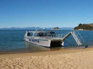 Travel by sea shuttle water taxis and walk the Abel Tasman Track